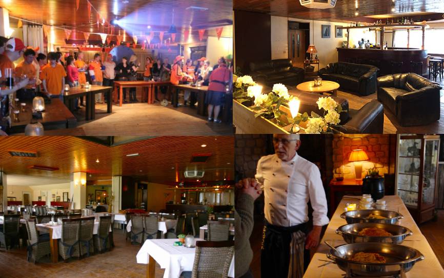 Grote zaal met opstelling voor diner, quiz of disco